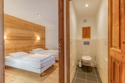 Llit o llits en una habitació de Chalet le Regain