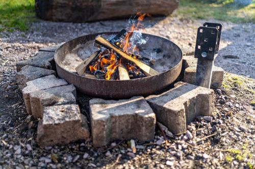 a fire pit with a bunch of rocks around it at Trekking Camp am Renchtalsteig in Oppenau