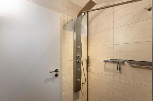 a shower with a glass door in a bathroom at Radolfzell Bodensee in Radolfzell am Bodensee