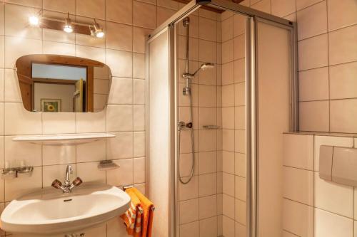 a bathroom with a sink and a shower at Anni in Leutasch