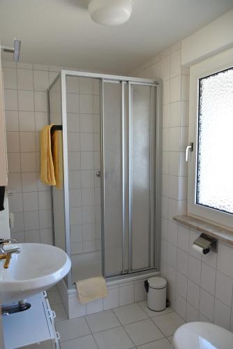 a bathroom with a shower and a sink at Haus Barbara Ott in St. Blasien