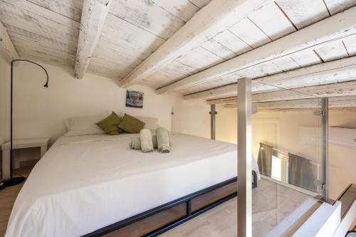 a bedroom with a large bed in a room at Casa Nica Nica in Palermo