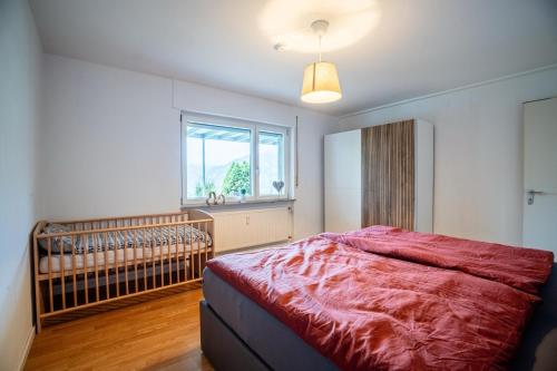 Gulta vai gultas numurā naktsmītnē Ferienwohnung Kinzigtalblick