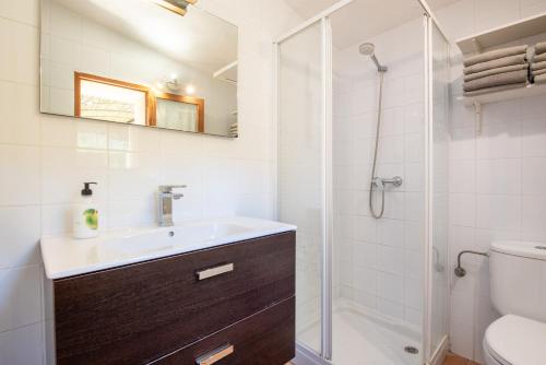 a bathroom with a sink and a shower at Sa Teulera Soller in Sóller