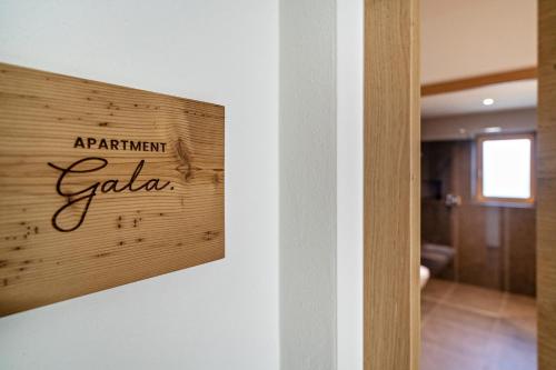 a sign that reads apartment gaia on a wall at Wiesgut Ferienwohnung Gala in Tesimo