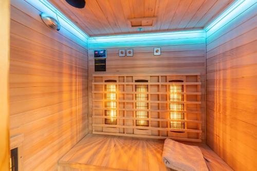 a room with a sauna with wooden walls at Hof Helmenhube 1 in Oberzent