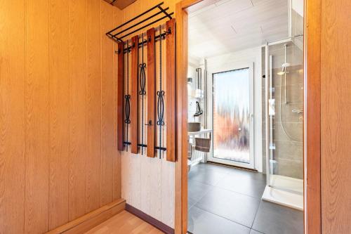 a bathroom with a shower and a glass door at Ferienwohnung Anne in Bremervörde
