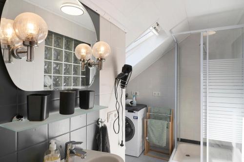 a bathroom with a sink and a mirror at Casa Renata in Schüller