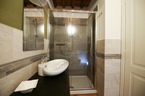 a bathroom with a sink and a shower at Casanova in Scandicci