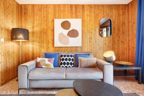 a living room with a couch and a table at Apartment Jose in Tremosine Sul Garda