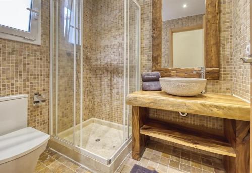 a bathroom with a sink and a shower at Costacabana - Villa Nicky in Lloret de Mar