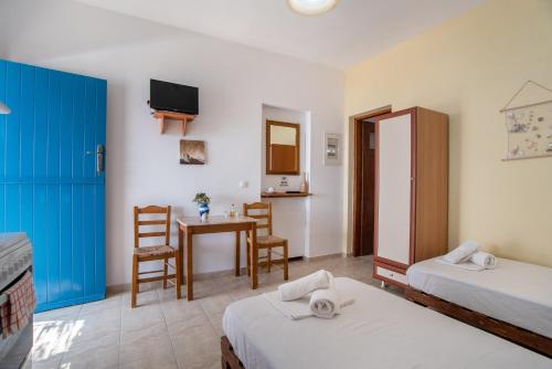Llit o llits en una habitació de Mesaria Studio