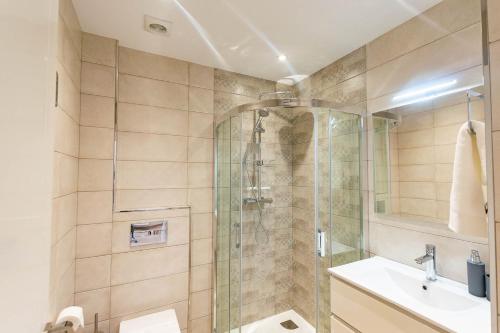 a bathroom with a shower and a sink at Modern Apartment in Cómpeta I in Cómpeta