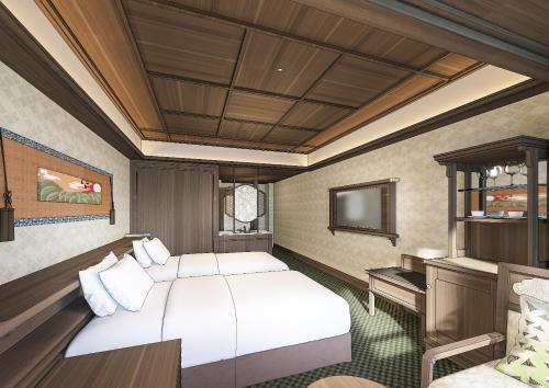 a bedroom with a bed and a desk and a television at Nara Hotel in Nara