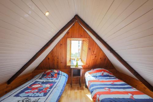 Postel nebo postele na pokoji v ubytování Maison Bateau
