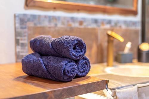 a teddy bear stacked on top of a counter at Mas Vizern avec bain nordique in Taillet