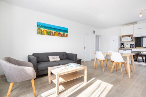 אזור ישיבה ב-Appartement Penfret Plain-pied