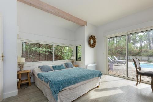 Llit o llits en una habitació de Pin Bleu