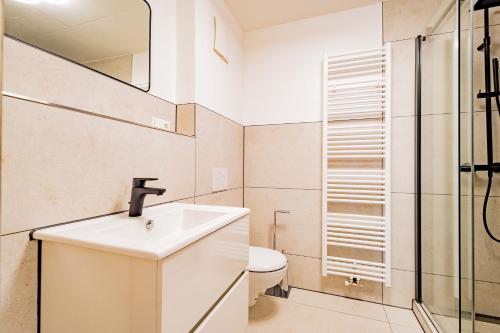 a bathroom with a sink and a toilet at Kim Fewo 4 in Emmendingen