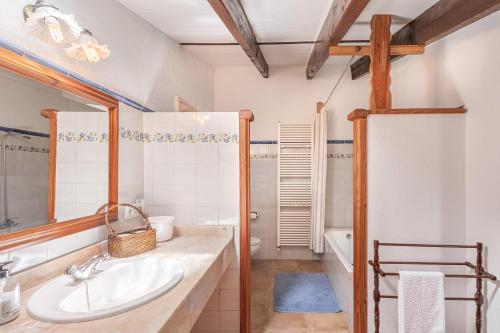 a bathroom with a sink and a shower at Son Galileu in Llucmajor