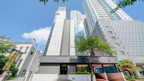 a view of a building in a city with tall buildings at VIP Hotel Mokpo in Mokpo