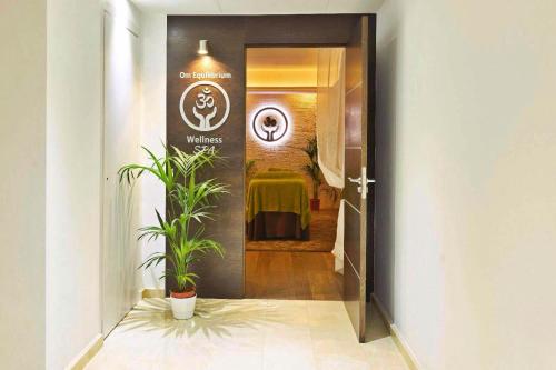 a hallway with a door leading to a room at Benabola Hotel & Suites in Marbella