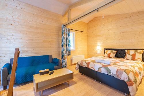 Postel nebo postele na pokoji v ubytování Chalet au calme