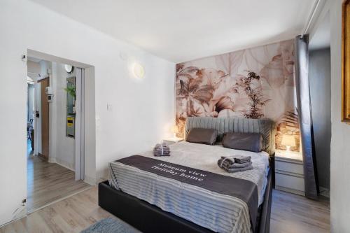 a bedroom with a large bed in a room at Museum View, vista sul museo in Sassello