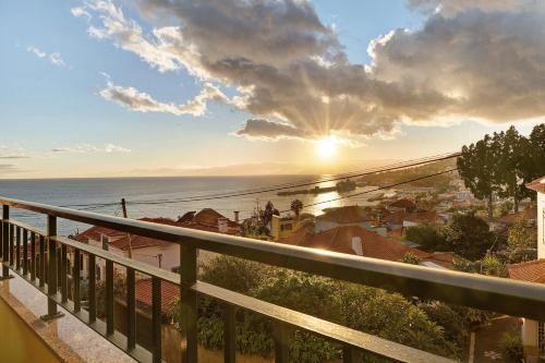 a view of the ocean from a balcony at Palheiro Residence Familiar 2 in Funchal