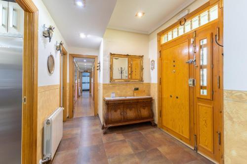 a bathroom with a sink and a mirror at Casa Rural Kalfonso in Mascaraque