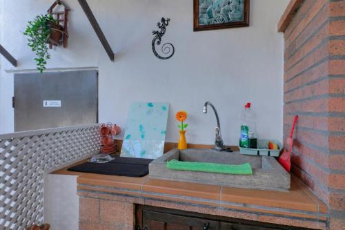 a kitchen counter with a sink in a room at Loft Cerca Del Mar Tenerife in Punta del Hidalgo