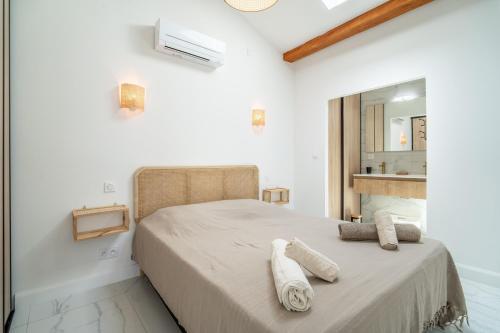 Llit o llits en una habitació de Villa Nina