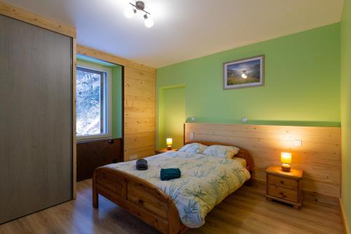 Postel nebo postele na pokoji v ubytování Le Bouquetin