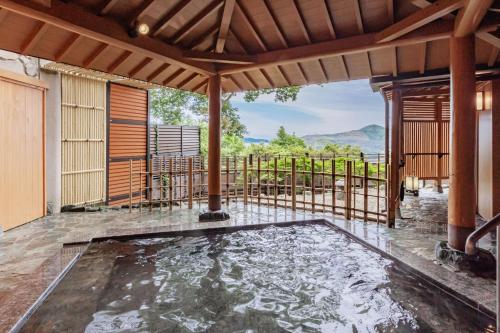 a pool of water in the middle of a house at Toba Ocean Resort All-Inclusive Hotel in Toba