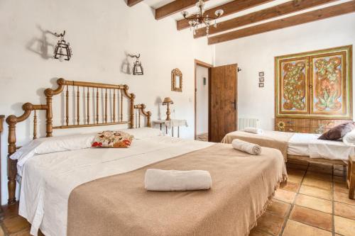a bedroom with two beds in a room at Madara in Monóvar