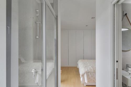 a bathroom with a shower and a sink at Suitme-Agaete in Agaete