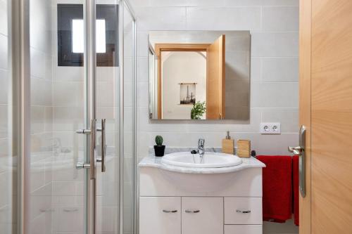 a bathroom with a sink and a shower at Apartamento La Estrella I in Playa Honda