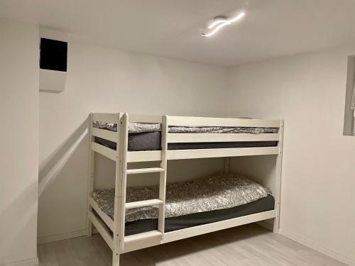 a bedroom with two bunk beds in a room at Haus Balke in Hatzfeld