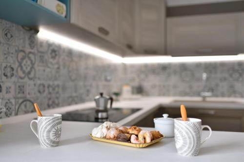 a plate of food on a counter in a kitchen at Dolcecasa in Dorgali