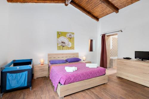Llit o llits en una habitació de Suite Harmony