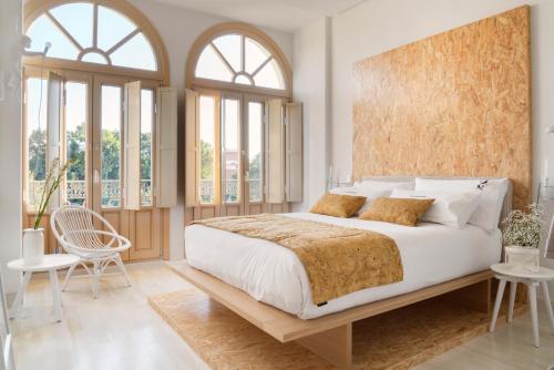 Posteľ alebo postele v izbe v ubytovaní Halcyon Days designer apartments by Ana Locking