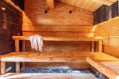 a wooden sauna with a hot tub in it at Ferienhaus am Berg in Hirschau