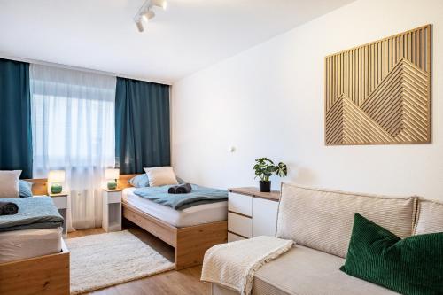 a living room with two beds and a couch at Fewo Am Feldberg Gipfel in Feldberg