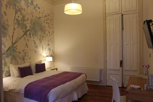 Katil atau katil-katil dalam bilik di Matildas Hotel Boutique