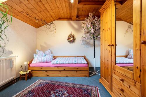 a bedroom with two beds in a room at Ferienwohnung Plötz in Bad Koetzting