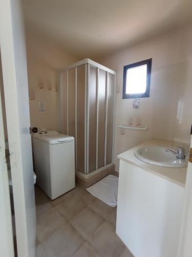 a bathroom with a toilet and a sink at Apartment Niceview in Alaior