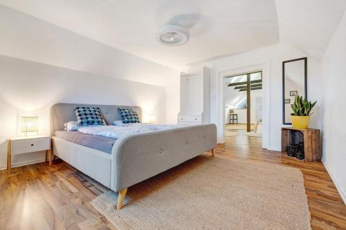 a bedroom with a large bed in a room at Ferienwohnung Örtzetal in Hermannsburg