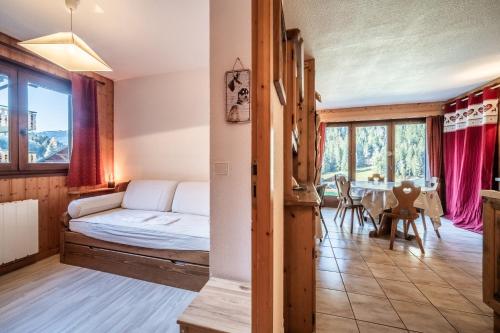 Llit o llits en una habitació de Appartement T3 Chatel