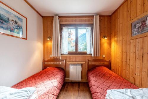 Postel nebo postele na pokoji v ubytování La Bévéria