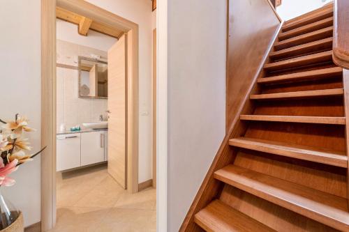 a staircase leading to a bathroom in a house at Residence Tatiana B2 in Tremosine Sul Garda